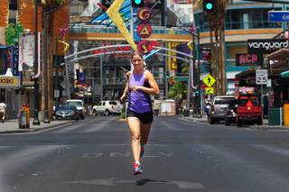 Tanya Carrier, seen downtown Tuesday, June 11, 2013, is a runner who is organizing new 5K fun runs for Las Vegas.