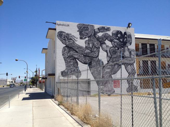 Zio Ziegler, a San Francisco-based muralist, created this mural on the back wall of the Western hotel.