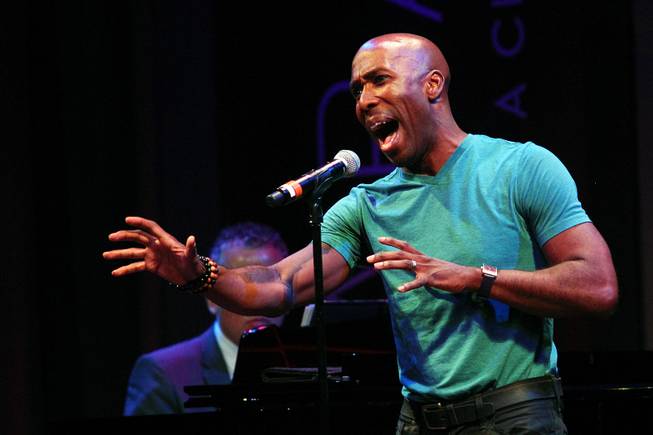 Eric Jordan Young sings during a performance of the Broadway-based open mic and variety show Cast Party on Wednesday, June 19, 2013, at Cabaret Jazz in the Smith Center.