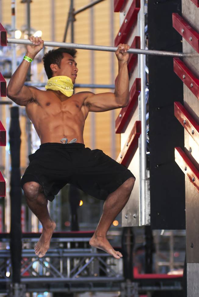 Obstacles are tested to ensure that they function safely and properly during Season 5 of “American Ninja Warrior” on Saturday, June 22, 2013, near the Strip.