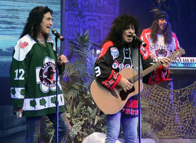 The band in "Raiding the Rock Vault" at LVH wears Las Vegas Wranglers jerseys during "Hotel California" on Sunday, June 23, 2013.