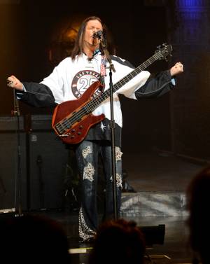 The band in "Raiding the Rock Vault" at LVH wears Las Vegas Wranglers jerseys during "Hotel California" on Sunday, June 23, 2013.
