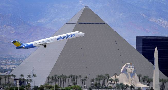 An Allegiant Air jetliner flies by the Luxor after taking off from McCarran International Airport, Thursday, May 9, 2013. While other U.S. airlines have struggled with the ups and downs of the economy and oil prices, Allegiant has been profitable for 12 straight years.