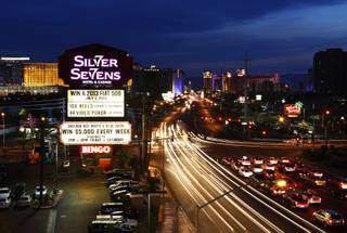 The neon sign at Silver Sevens Hotel & Casino is ceremonially lit in Las Vegas on Monday, July 1, 2013. Silver Sevens Hotel & Casino was formerly known as Terrible's Hotel and Casino.