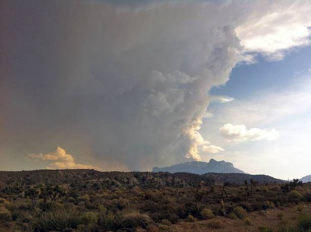Smoke billows from a fire on Mount Charleston west of Las Vegas, Thursday, July 4, 2013.