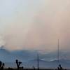 Smoke from the multiple spots is seen as the Carpenter One fire continues to burn uncontrolled Saturday, July 6, 2013.