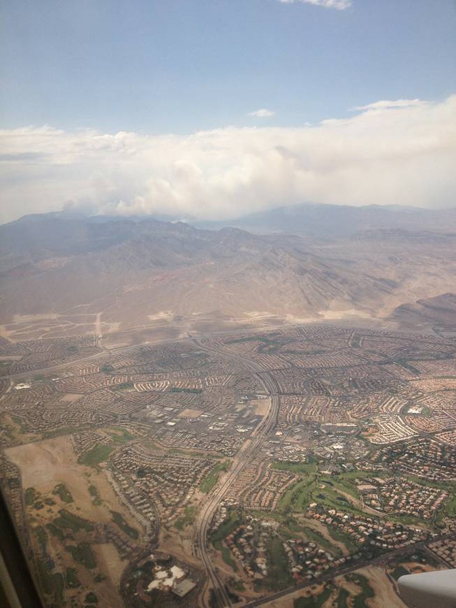 Smoke from Mount Charleston wildfire was visible to passengers taking off from McCarran International Airport Saturday, July 6.