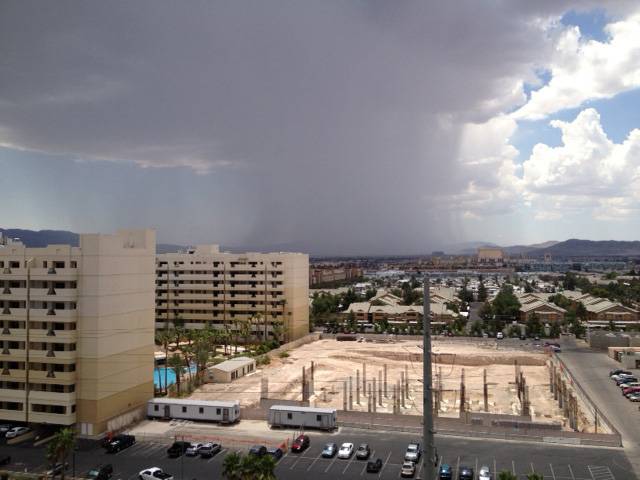 A thunderstorm moves through the southern Las Vegas Valley at noon Sunday, photographed from near Las Vegas Boulevard and Blue Diamond Road looking south. Spotty storms broke out early in the day, and a flash flood warning was in effect until 2:30 p.m.
