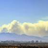 Smoke from the Carpenter 1 wildfire is seen with the Las Vegas Strip in the foreground on Monday, July 8, 2013.