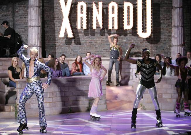 The cast of "Xanadu" performs the closing number on roller skates during a dress rehearsal of the musical in New York in this May 22, 2007 file photo. 