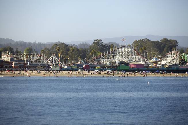 The Giant Dipper roller coaster snakes across the Santa Cruz Beach Boardwalk in Santa Cruz, Calif., July 13, 2013. In one topsy-turvy, dizzying trip from the Bay Area to Los Angeles, Mekado Murphy recently rode 40 roller coasters in eight parks across California.