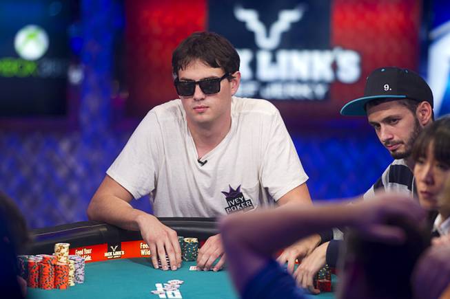 Mark Newhouse of Las Vegas competes during the seventh day of the World Series of Poker $10,000 buy-in no-limit Texas Hold 'Em at the Rio Monday, July 15, 2013.