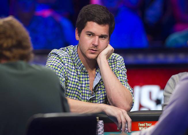David Benefield of Arlington, Texas competes during the seventh day of the World Series of Poker $10,000 buy-in no-limit Texas Hold 'Em at the Rio Monday, July 15, 2013.