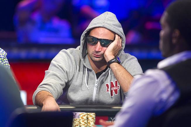 Sylvain Loosli of France competes during the seventh day of the World Series of Poker $10,000 buy-in no-limit Texas Hold 'Em at the Rio Monday, July 15, 2013.