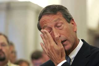 South Carolina Gov. Mark Sanford wipes his tears as he admitted to having an affair during a news conference Wednesday, June 24, 2009, and was the reason why he was in Argentina.  He also announce that he is resigning as chairman of the Republican Governors Association.