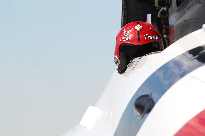 Lt. Col. Greg Moseley's helmet sits on his F-16 as the Thunderbirds resume limited flight operations at Nellis Air Force Base Tuesday, July 22, 2013 after having to stand down since April because of sequestration.