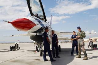 Maj. Blaine Jones gets ready to board his aircraft as the Thunderbirds resume limited flight operations at Nellis Air Force Base Tuesday, July 22, 2013 after having to stand down since April because of sequestration.