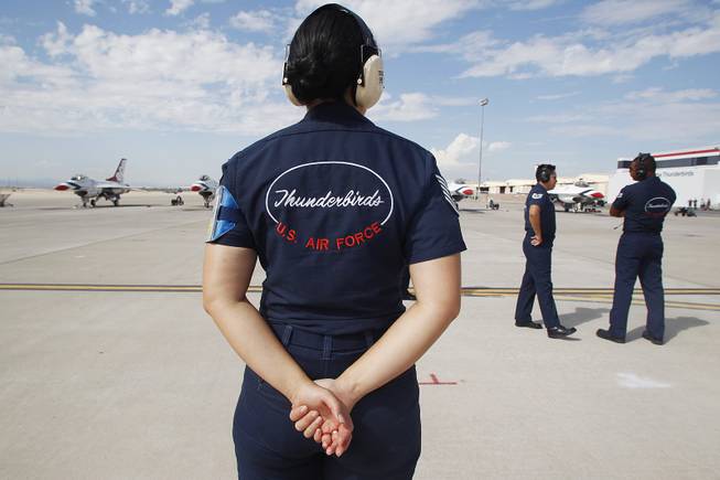 TSgt. Alice Diddle stands by as the Thunderbirds resume limited flight operations at Nellis Air Force Base Tuesday, July 22, 2013 after having to stand down since April because of sequestration.
