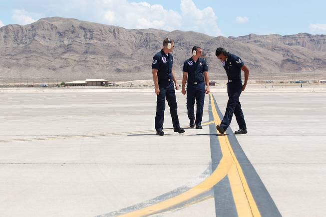 From left, SSgt. Richard Ingram and SSgt. Benjamin Ayivorh as the Thunderbirds resumed limited flight operations at Nellis Air Force Base Tuesday, July 22, 2013 after having to stand down since April because of sequestration.