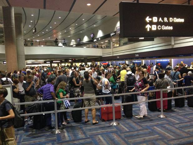 A computer problem caused long lines at ticket counters at McCarran International Airport in Las Vegas on Thursday, July 25, 2013.