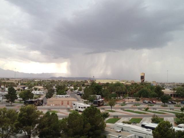 A thunderstorm passes through the western Las Vegas Valley on Sunday, July 28, 2013. Heavy rains from the storm prompted a flash flood warning for central Clark County.