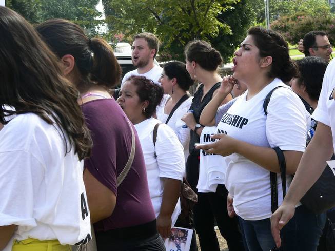 Astrid Silva, an activist with PLAN and a Nevada immigrant with deferred action status, chants pro-immigration slogans at a demonstration at the Longworth House Office Building in Washington, D.C., on Thursday, July 31, 2013.