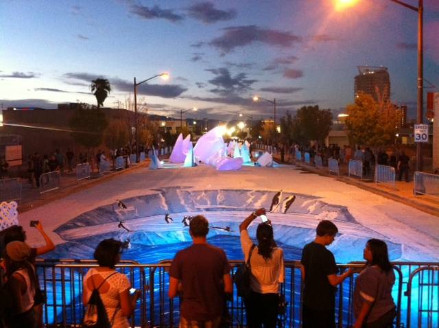 A blocklong section of Casino Center Boulevard has been transformed into an ice-themed 3-D street mural for First Friday on Aug. 2, 2013.