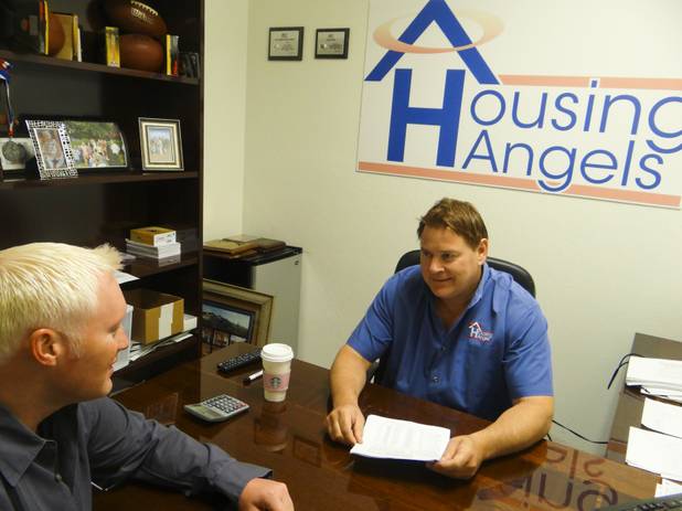 Dave Dziedzic, founder of Housing Angels, meets with a client, Feb. 14, 2013.
