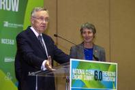 Senate Majority Leader Harry Reid (D-NV) responds to a question about the stalled Yucca Mountain nuclear waste storage facility during a news conference at the National Clean Energy Summit 6.0 at the Mandalay Bay Tuesday, Aug. 13, 2013. Interior Secretary Sally Jewell listens at right.