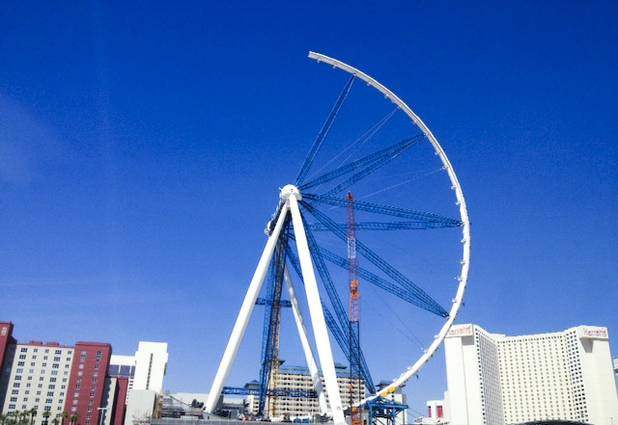 The High Roller observation wheel is seen halfway completed Wednesday, Aug. 14, 2013. The wheel is part of Caesars Entertainment's $550 million Linq retail-entertainment-restaurant development.