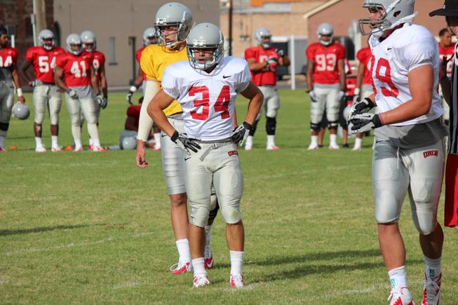 UNLV freshman running back Henry Jussila awaits instructions at the Rebels' scrimmage on Saturday, August 17, 2013, in Ely.