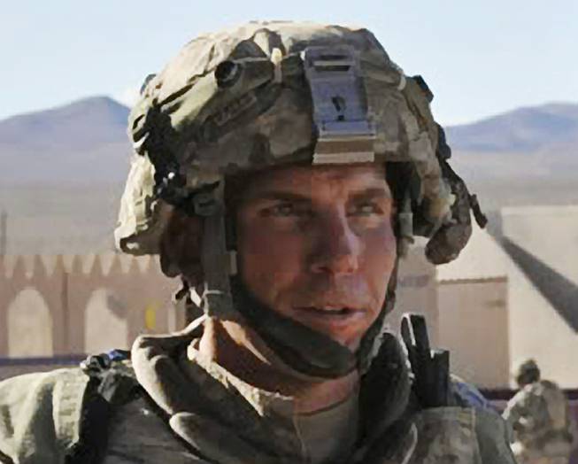 In this Aug. 23, 2011, photo from the Defense Video & Imagery Distribution System, Staff Sgt. Robert Bales participates in an exercise at the National Training Center at Fort Irwin, Calif. On Friday, Aug. 23, 2013, a military jury sentenced the U.S. soldier who massacred 16 Afghan civilians in 2012 to life in prison without a chance of parole. Bales pleaded guilty in June in a deal to avoid the death penalty for one of the worst atrocities of the Iraq and Afghanistan wars.