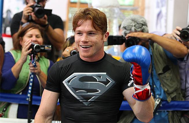 Boxer Canelo Alvarez of Mexico is shown during a workout in Big Bear, Calif. Tuesday, August 27, 2013. Alvarez will face undefeated boxer Floyd Mayweather Jr. in a WBC/WBA 154-pound title fight at the MGM Grand Garden Arena in Las Vegas on September 14. Hogan Photos/Golden Boy Promotions
