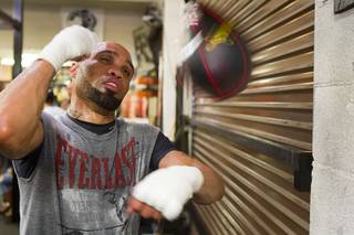 IBF 154-pound champion Ishe Smith hits a speedbag at the Mayweather Boxing Club on Wednesday, Aug. 28, 2013. Smith will defend his title against Carlos Molina of Mexico on Sept. 14 at the MGM Grand Garden Arena.