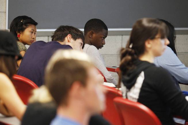 Ke'Andre Blackston Jr., a 14-year-old freshman at UNLV, listens during a theater class.