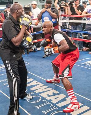 Undefeated boxer Floyd Mayweather Jr. hosts a workout for media at Mayweather Boxing Club in Las Vegas on Wednesday, Aug. 28, 2013.