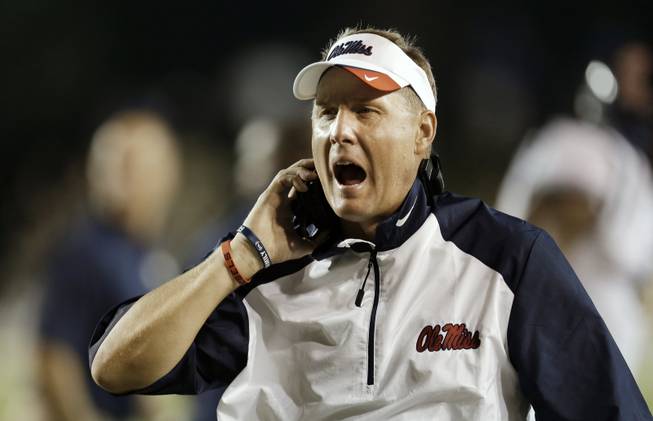 Mississippi head coach Hugh Freeze yells to an official in the fourth quarter of an NCAA college football game against Vanderbilt on Friday, Aug. 30, 2013, in Nashville, Tenn. Mississippi won 39-35. 