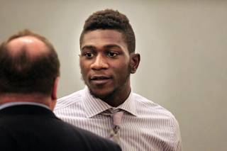 UNLV basketball player Savon Goodman appears for an arraignment in Las Vegas Justice Court at the Regional Justice Center in Las Vegas on Friday, August 30, 2013.