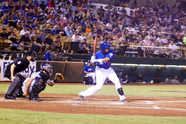 Francisco Pena homers for the Las Vegas 51s against Tucson, Saturday, Aug. 31, 2013. The 51s beat Tucson Padres, 8-6, and clinched the Pacific Coast League Southern Division title.