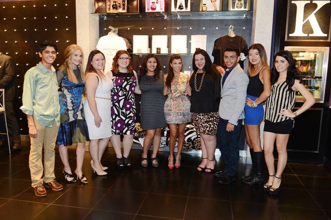Cici Bussey, second from left, and Kourtney Kardashian, fifth from ...