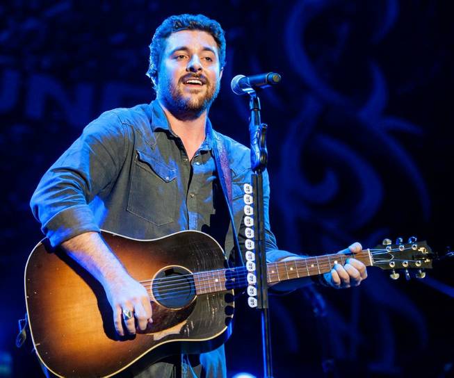 Opening act Chris Young performs during headliner Brad Paisley's Beat This Summer Tour stop at Mandalay Bay Events Center on Saturday, Aug. 31, 2013.
