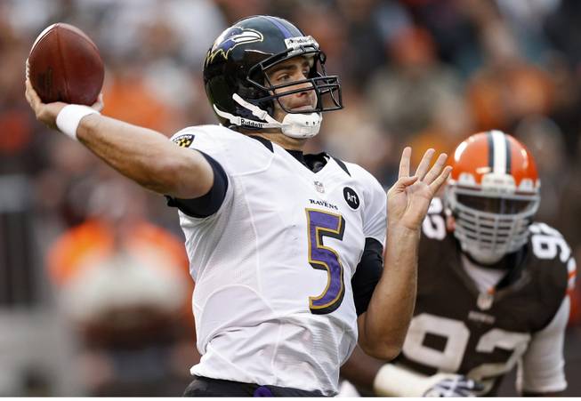 Baltimore Ravens quarterback Joe Flacco (5) passes against the Cleveland Browns in the fourth quarter of an NFL football game in Cleveland, Sunday, Nov. 4, 2012. 