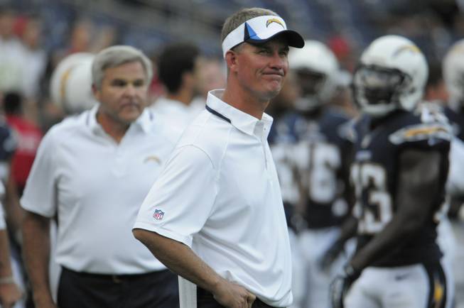 San Diego Chargers head coach Mike McCoy looks on before the Charges play the San Francisco 49ers in an NFL preseason football game, Thursday, Aug. 29, 2013, in San Diego. 