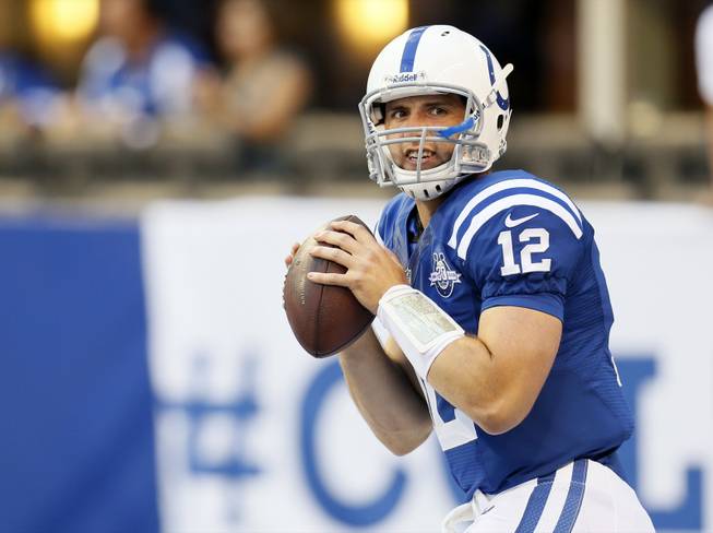 Indianapolis Colts quarterback Andrew Luck throws before a preseason NFL football game against the Cleveland Browns in Indianapolis, Saturday, Aug. 24, 2013.
