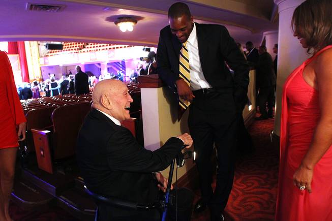 Former UNLV coach Jerry Tarkanian has a laugh with current assistant coach Stacey Augmon after his induction into the Naismith Memorial Basketball Hall of Fame Sunday, Sept. 8, 2013 at Symphony Hall in Springfield, Mass.
