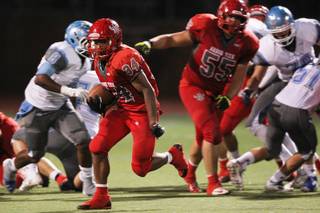 Arbor View running back Herman Daoang-Gray III takes off against Centennial during their game Thursday, Sept. 12, 2013. Arbor View cruised to a 35-7 win.