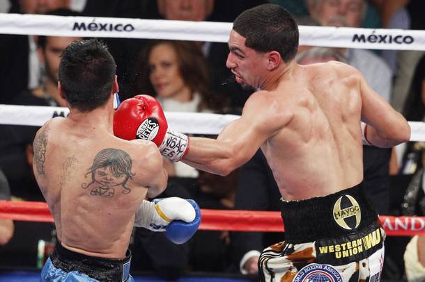 Danny Garcia hits Lucas Matthysses with a left during their fight Saturday, Sept. 14, 2013 at the MGM Grand Garden Arena.