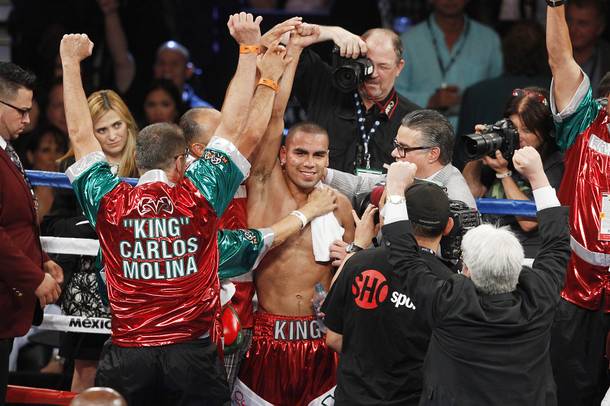 Carlos Molina celebrates his win over Ishe Smith during their fight Saturday, Sept. 14, 2013 at the MGM Grand Garden Arena.