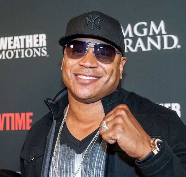 LL Cool J arrives at the pre-fight red carpet for ...