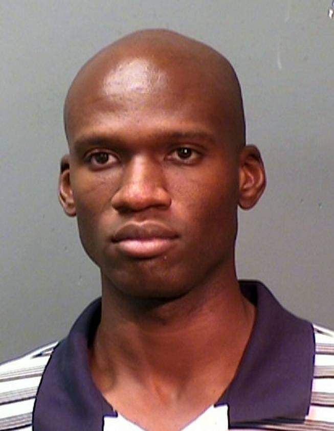 This undated photo provided by the Fort Worth Police Department shows a booking mug of Aaron Alexis, arrested in September, 2010, on suspicion of discharging a firearm in the city limits. Alexis is suspected to be the shooter at the Washington D,C. Navy Yard Monday, September 16, 2013. 